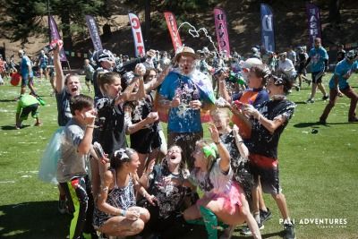Group of campers and their counselor covered in shaving cream and having fun at Pali Adventures Summer Camp