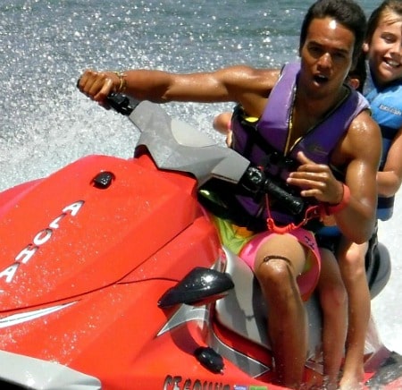 Camper and counselor jet skiing at Aloha Beach Camp