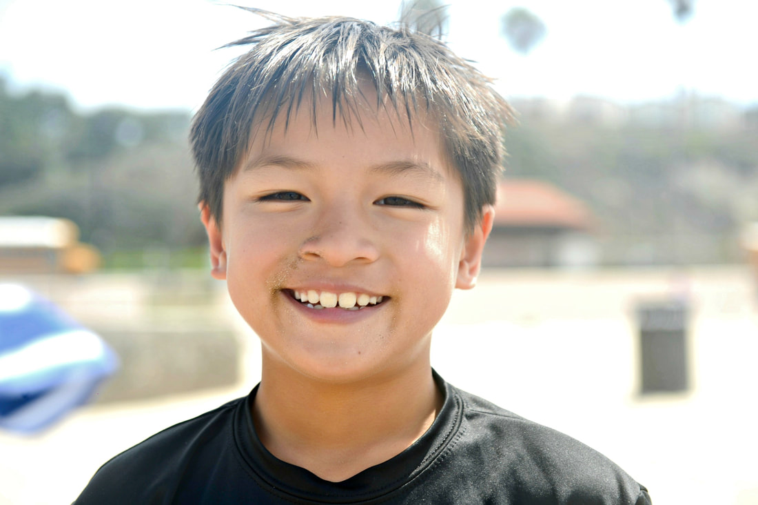 Boy from Costa Mesa smiling at summer camp