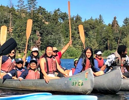 Campers and staff canoeing at UCLA Uni Camp